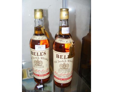 Four Bell's Scotch Whisky bottles 'Extra Special'
