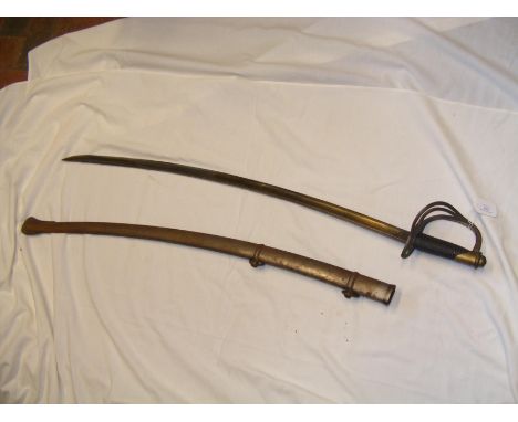 An antique cutlass - the curved blade marked USADK 1862, with scabbard - 106cms long CONDITION REPORT Our team of trusted exp