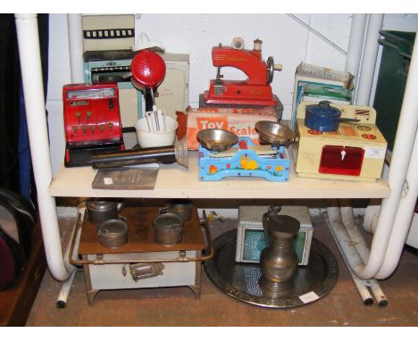 A collection of vintage tinplate toys, including Chad Valley toy scales and Mettoy cooker, together with a vintage Player's c