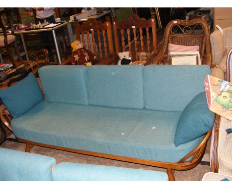 A vintage mid-century Windsor style Ercol day-bed with removable back rest
