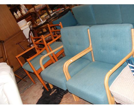 Two Scandinavian style light wood framed armchairs upholstered in teal fabric together with two similarly upholstered chairs