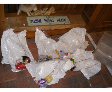 A vintage Pelham puppet theatre together with puppets and vintage toys