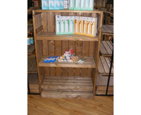 A three shelf pine shop display stand