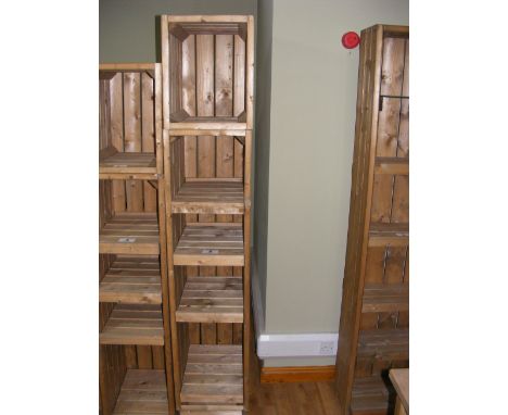 A similar pine shelf display unit with box top
