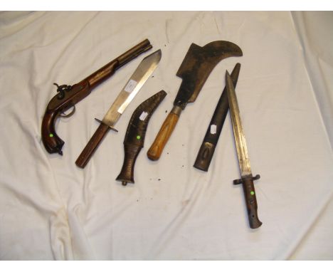 An old sword bayonet with scabbard, billhook etc.
