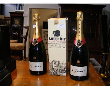 A boxed Malt Scotch Whisky 'Sheep Dip' together with two bottles of Bollinger
