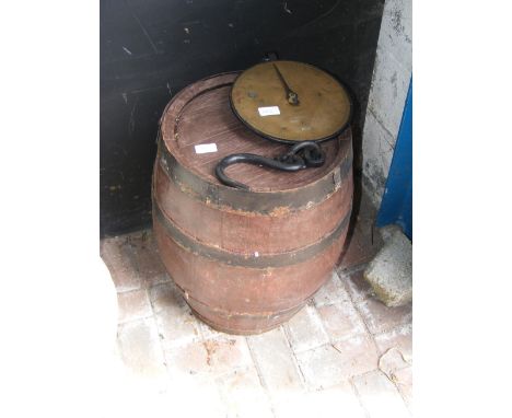 An old metal bound barrel, together with a set of hanging Salter's spring scales 