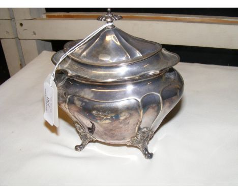 A silver tea caddy - 13cm high