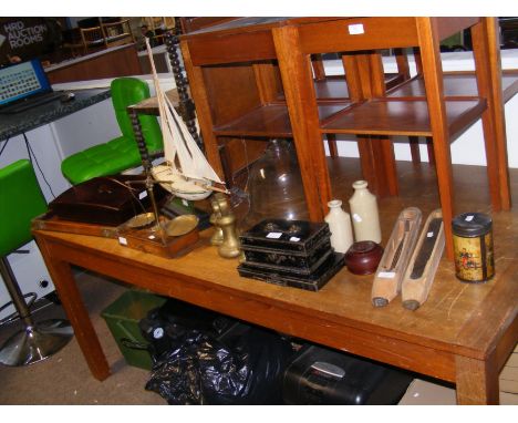A glass bell cloche, vintage model sailing boat, a set of brass scales and other collectables  