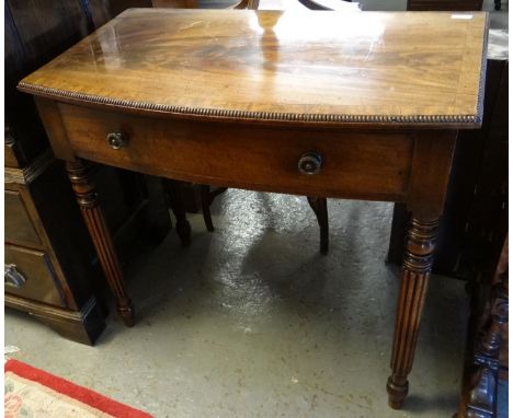 Victorian mahogany bow front single drawer side table on fluted tapering legs.  90x52x84cm approx.  (B.P. 21% + VAT) 