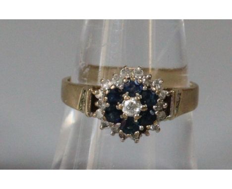 9ct gold blue and white stone cluster ring.  2.7g approx.  Size M.   (B.P. 21% + VAT) 