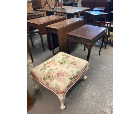 19th century mahogany drop leaf table on baluster ring turned legs and casters together with a mahogany side table on cabriol