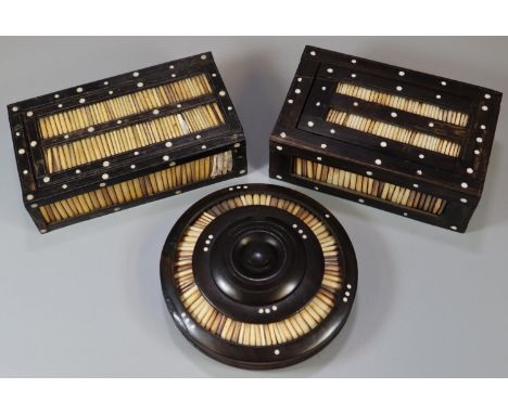 Two similar porcupine quill and ebony wood boxes with sliding lids together with a porcupine quill and ebony wooden inkwell o