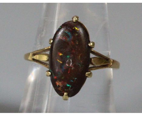 Probably 9ct gold opal ring. Indistinct hallmark. (B.P. 21% + VAT)  Ring size M.