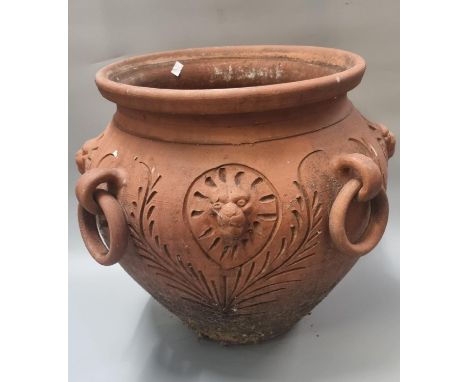 Large terracotta planter/jardinière with moulded lion mask mounts and ring handles.    (B.P. 21% + VAT) 