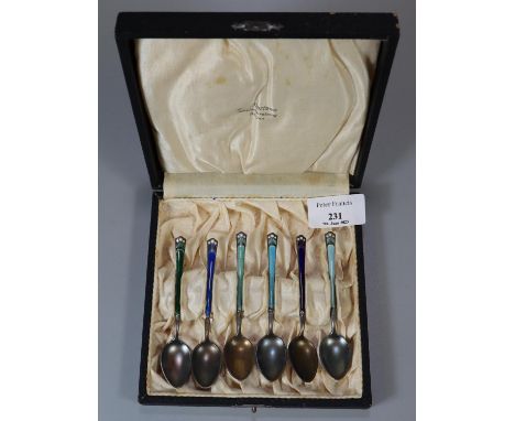 Set of enamel 925 cased spoons.  1.75 troy oz approx.   (B.P. 21% + VAT) 