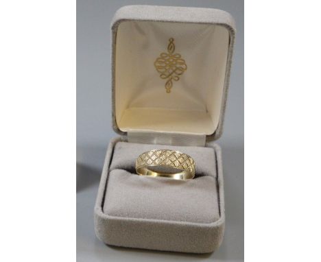 14ct gold textured ring.  2.7g approx.  Size W.   (B.P. 21% + VAT) 