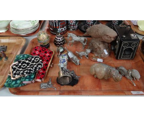 Tray of assorted items to include: three vintage woollen Welsh tapestry purses, various animal figures; hand made clay sculpt