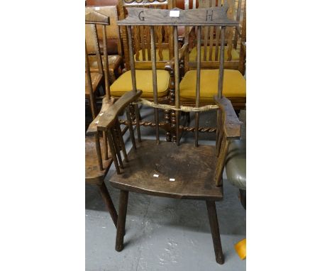 Primitive style stained stick back chair with carved initials G H.  (B.P. 21% + VAT) 
