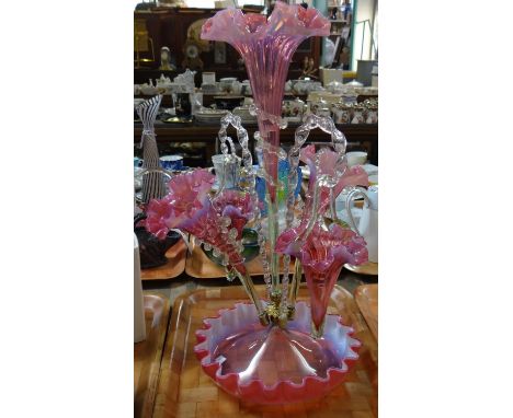 Victorian cranberry and clear glass table epergne. (B.P. 21% + VAT)  This is a period Victorian piece.  One flute and one bas