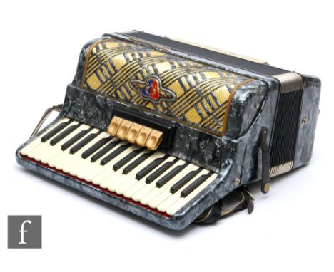 A Baracole seventy nine key accordion in grey marbled effect case and outer simulated crocodile skin case, width 42cm. 