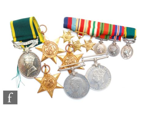 A group of six medals awarded to 916163. DVR P.J.Danks R.E.M.E, 8th Army, comprising George VI Territorial medal, Defence med