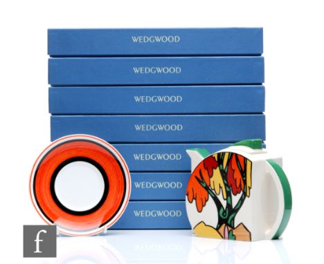 A Wedgwood Clarice Cliff Collectors Club Stamford shape teapot decorated in the Honolulu pattern, together with seven boxed s