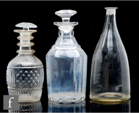 An 18th Century Indian club form decanter with slender tapered neck and shallow lip, lacks stopper, height 24.5cm, together w