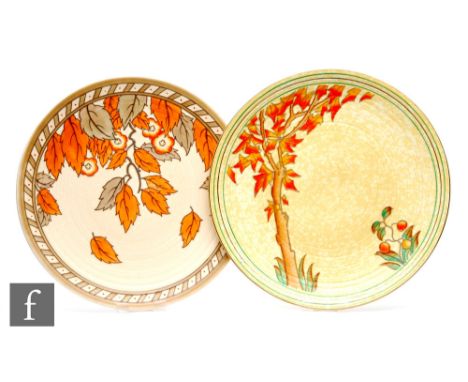 Two 1930s Charlotte Rhead for Crown Ducal chargers, the first decorated in the 4921 Golden Leaves pattern, the second in the&