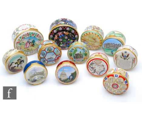 Twelve Halcyon Days Enamel pill or trinket boxes of varying size to include two larger examples lacking mechanical music move