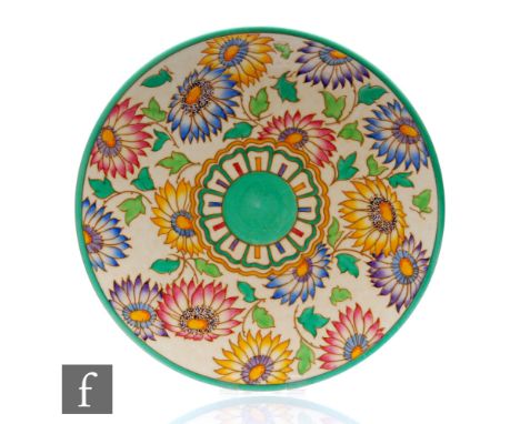 A 1930s Art Deco Charlotte Rhead for Bursley Ware charger decorated in the TL37 Daisies pattern, printed mark, diameter 31cm.