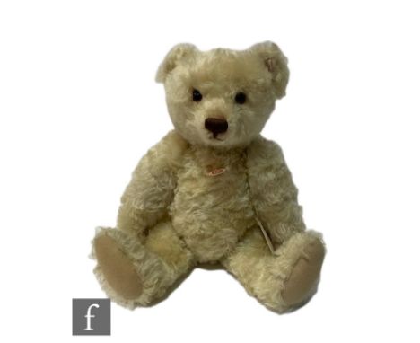 A Steiff&nbsp;035746 Sunny Teddy Bear, pale yellow mohair, limited edition 145 of 1000, with chest tag, certificate, and box,