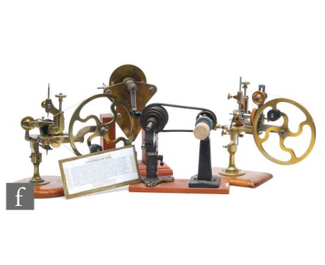 A 19th Century watchmaker's topping tool with shaped circular spoked fly wheel, another similar, a rounding up tool with hand
