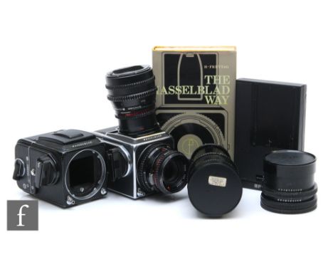 A collection of Hasselblad camera bodies and accessories, to include a 500C/M body serial number UP150524, with Carl Zeiss 1: