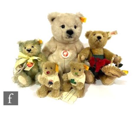 A collection of Steiff teddy bears, comprising 010606 Classic polar bear, 654824 Gardening Bear, 028175 Spring teddy bear, 66
