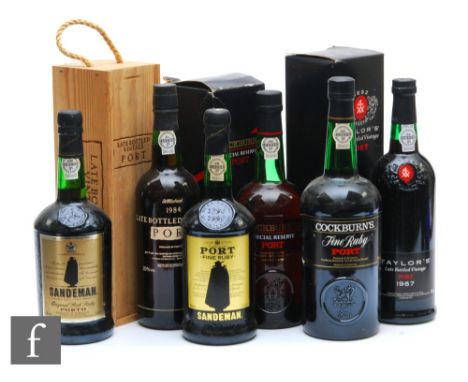 A collection of port, to include two bottles of Sandeman ruby port, a boxed 1987 bottle of Taylor's vintage port, a 1984 boxe
