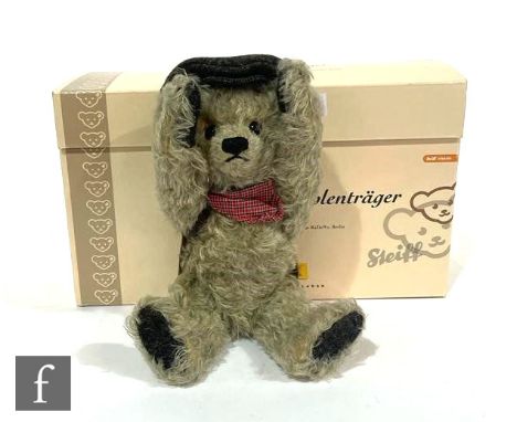 A&nbsp;Steiff 'The Coal Carrier' teddy bear made for KaDeWe, Berlin, retains hand cart and coal load, white tag 656248, numbe