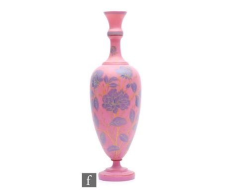 A large 19th Century continental glass vase, the slender ovoid form with stepped foot and knopped stem, cased in pale pink ov