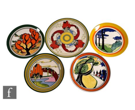 A Wedgwood Clarice Cliff Centenary charger decorated in the Solitude pattern, diameter 30.5cm, together with four limited edi