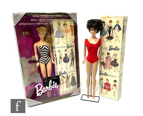 A Mattel Barbie doll, circa 1962-1967, brunette bubble cut, wearing earrings, red swimsuit and with one red open toed heel, w