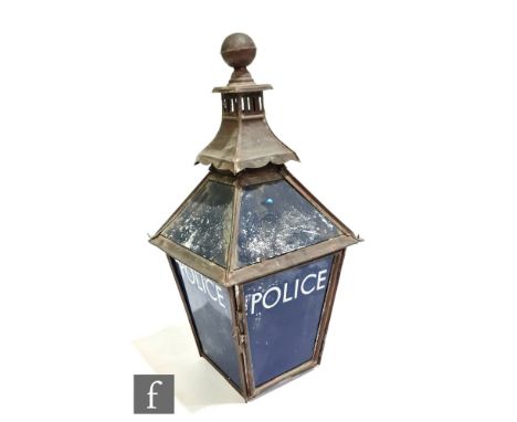 A post 1940s police station lamp, copper framed and glass panels, height 85cm, damaged. 