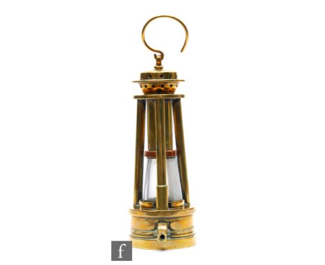 An Ashworths Hepplewhite Gray patent brass miner's lamp, stamped GB11, complete with hanging ring, height 26cm. 