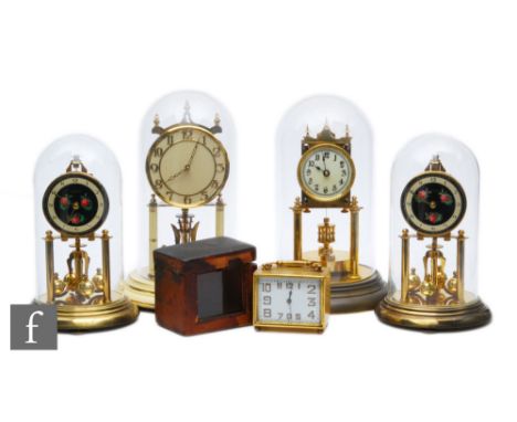 A 20th Century brass carriage clock in leather case and four 365 day mantle clocks in glass and Perspex domes. (5) 