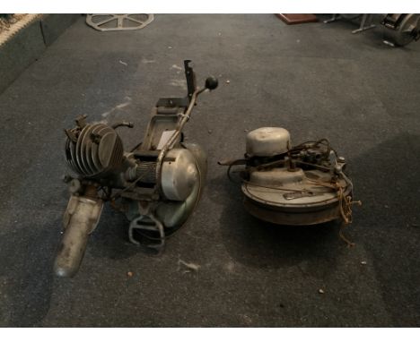 A BSA winged wheelunnumbered together with an unidentified engine (unnumbered), condition and completeness unknown, close ins