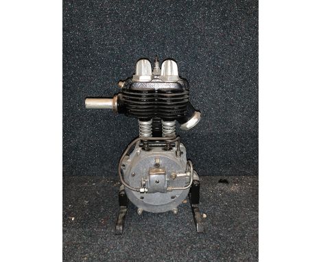 A New Hudson enginenumbered 0T8411, mounted on metal base; condition and completeness unknown, close inspection advised.  Lot