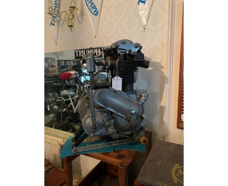 An unidentified engineunnumbered, mounted on metal base, condition and completeness unknown, close inspection advised.  Lot t