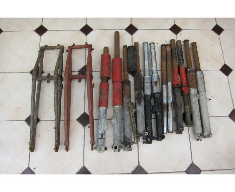 A quantity of front fork componentsincluding two girder fork blades, AJS/Matchless, BSA and Triumph, completeness and conditi
