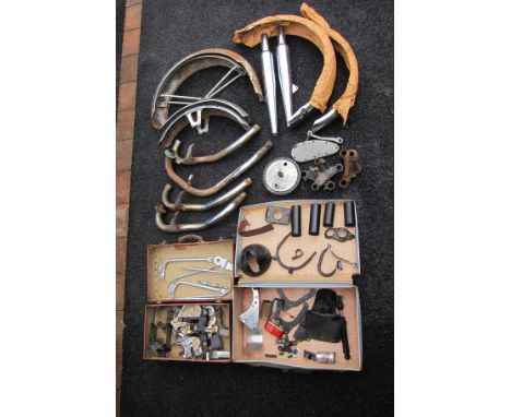 A quantity of mainly BSA parts and tinware (some Gold Star)including fork yokes, mudguards, silencers, exhaust pipes and othe