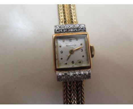 A 9ct yellow gold diamond set manual wind ladies Mappin cocktail watch - running - total weight approx 20 grams 