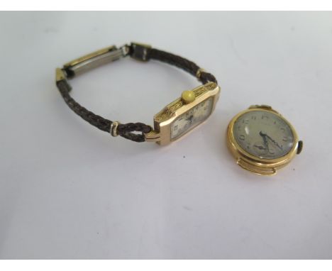 A 9ct yellow gold manual wind ladies wristwatch on a leather strap - running - total weight approx 12 grams and a 18ct watch 